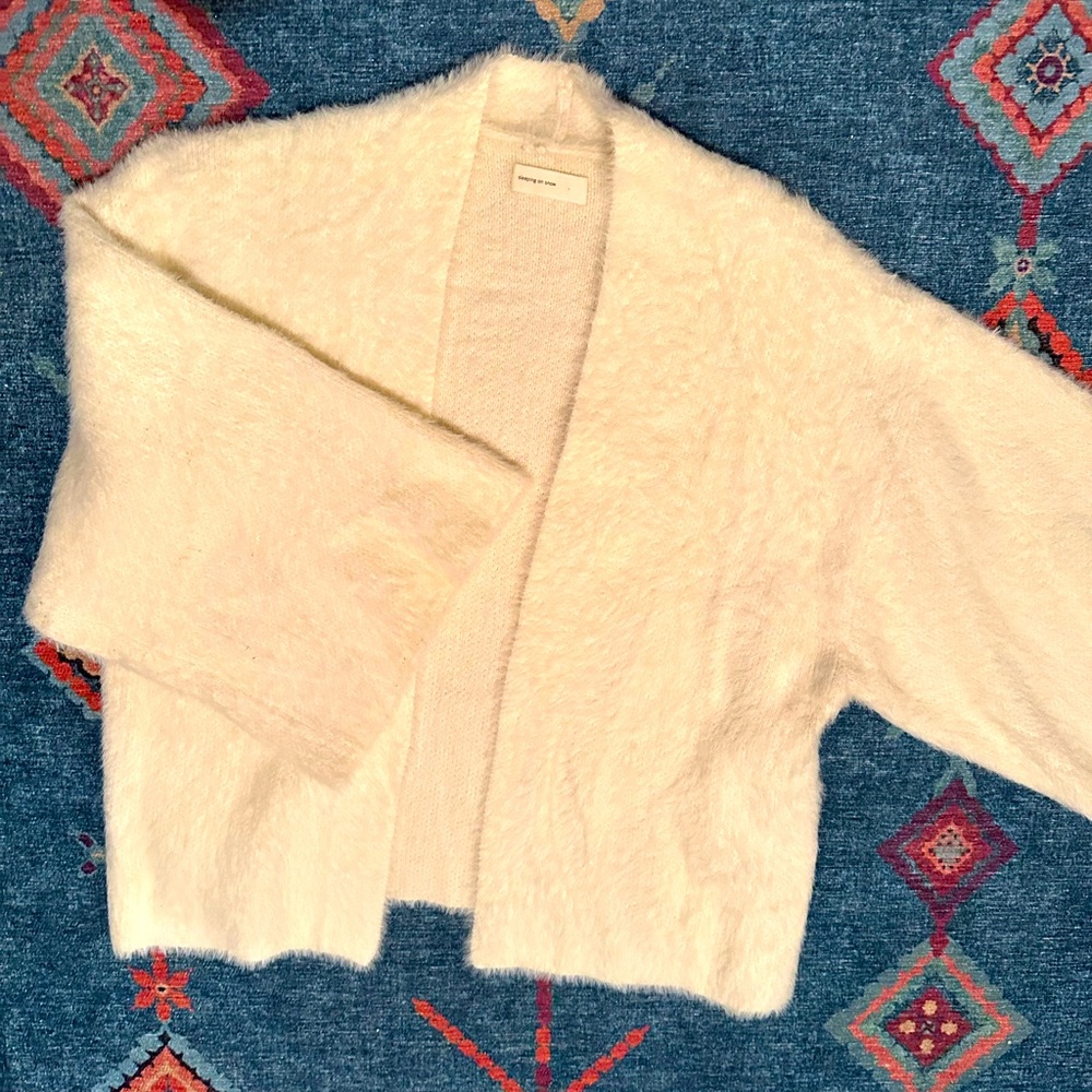 Sleeping on snow brand, perfect condition, cream color, very soft and fuzzy